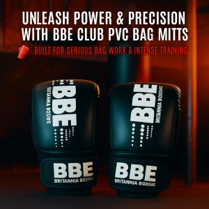 BBE Club PVC Bag Mitts in black displayed in a vibrant boxing gym with bold branding — premium punch bag training gloves for serious boxing workouts, available in S/M and L/XL sizes at Heroes Fitness Store Norwich.