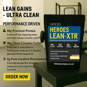 Heroes LEAN-XTR™ lean muscle protein vanilla powder with whey, casein, creatine, and clean carbs – ultra-clean all-in-one supplement for strength, endurance, and performance, displayed on gym bench with modern fitness background